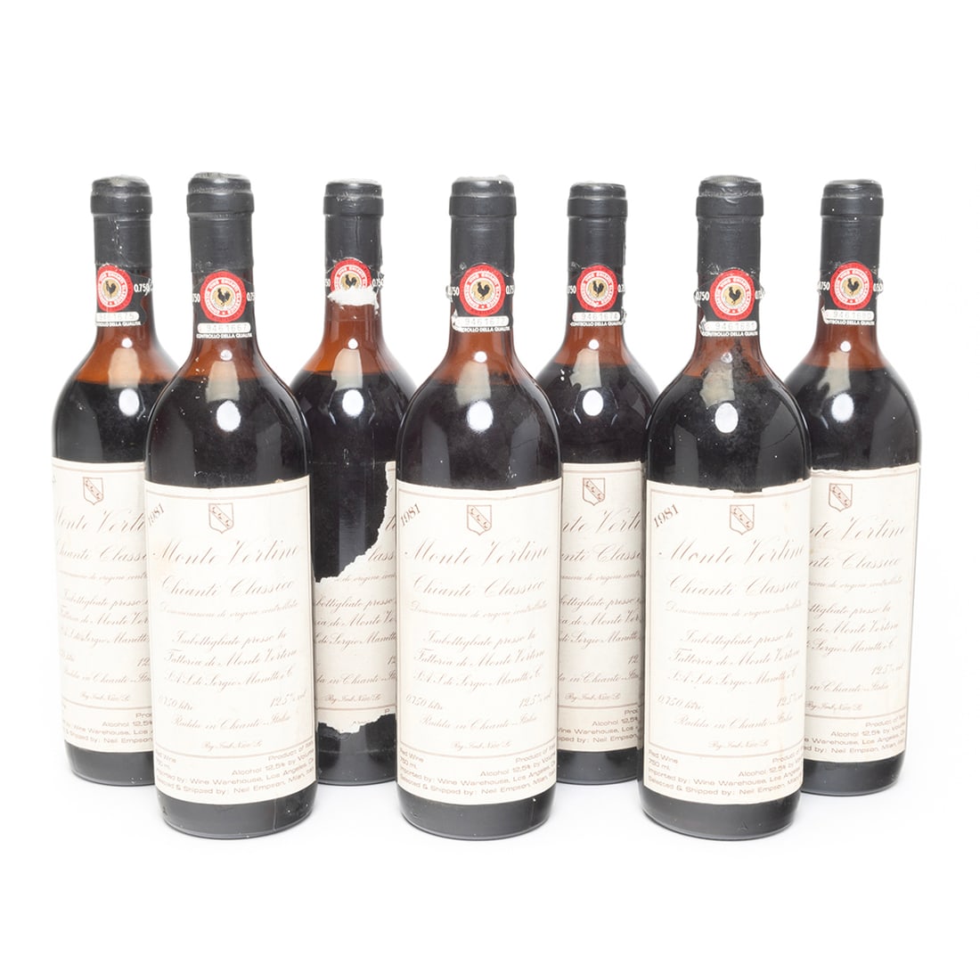 Seven Bottles 1981 Monte Vertine Chianti Classico Wine: Seven Bottles 1981 Monte Vertine Chianti Classico Wine. Seven bottles Monte Vertine Chianti Classico Italian wine. Bottles with labels indicating their numbers: 9461667, 1672, 1674, 1675,1680, 1681,on