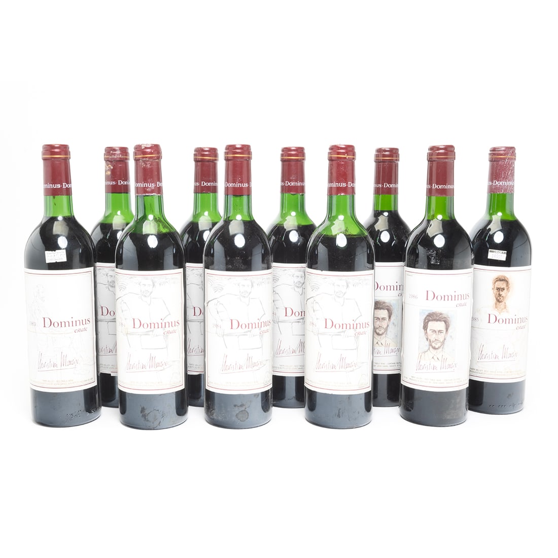 Ten Bottles 1983-1987 Dominus Estate Red Wine: Ten Bottles 1983-1987 Dominus Estate Red Wine Christian Moueix's Dominus red. Comprising one bottle 1983, six bottles 1984, one bottle 1985, and two bottles 1985. Bottled by John Daniel Society. Napa 