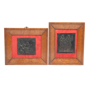 Two Framed Bronze Bas Reliefs after the Antique