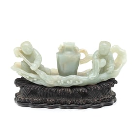 A Chinese Carved Jade Boat and Wooden Stand