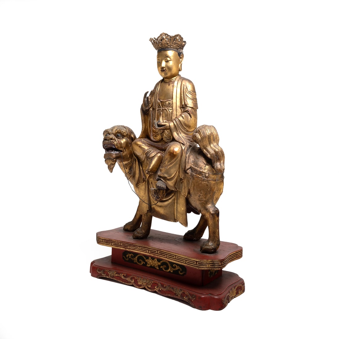 A Carved and Gilt Guanyin on Beast: A Carved and Gilt Wooden Guanyin on Standing Beast. Carved as a Bodhisattva seats on the standing mythical beast, right hand on prithvi mudra, while the left hand holding a bottle, all on the red lacq
