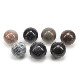 Seven Assorted Marble Spheres on Lucite Bases