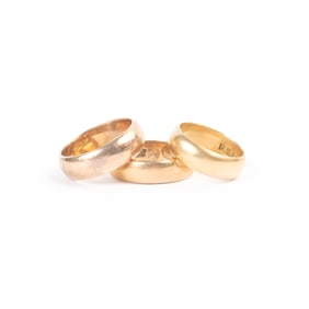 Collection of Three Yellow Gold Bands.