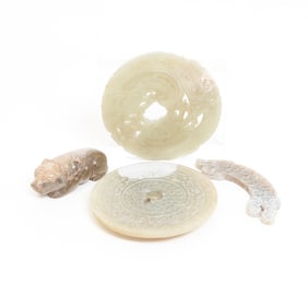 Group of Four Archaistic Carved Jade Items