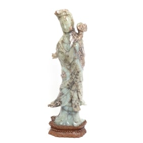 A Large Carved Jade Standing Figure of Guanyin