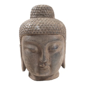 A Large Carved Limestone Buddha Head