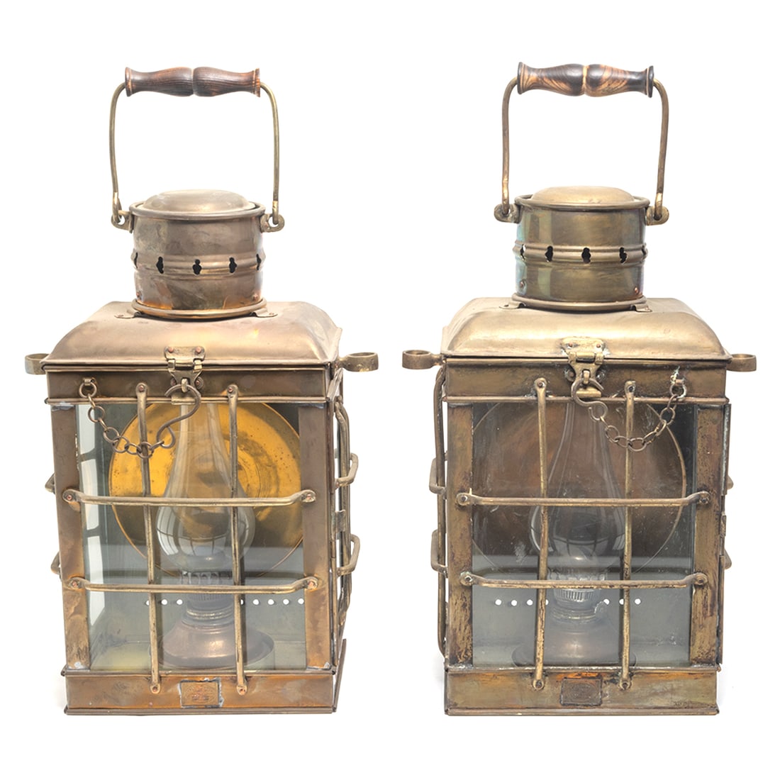 Pair of Brass Davey London Ship Lanterns: Pair of Brass Davey London Ship Lanterns. Brass case with glass paneled sides, brass oil lamp to interior. Plaques to front read 'DAVEY LONDON / APPROVED / 1924 / SHIPS LAMP'. {Approximate dimensions: