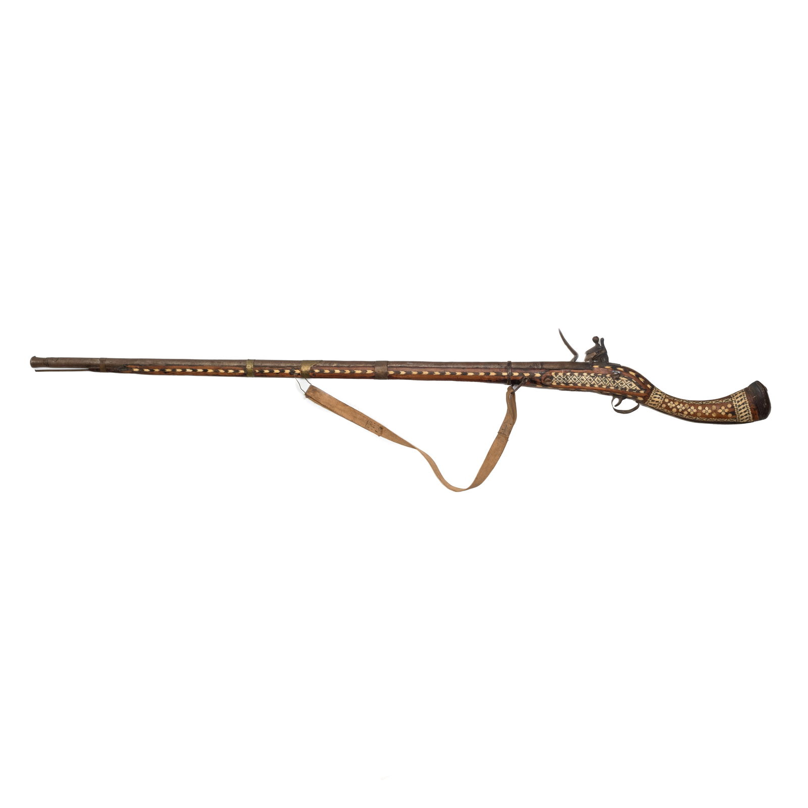 Antique Middle Eastern Inlaid Flintlock Jezail Musket: Antique Middle Eastern Inlaid Flintlock Jezail Musket. Inlaid with bone and and what looks to be horn. With what looks to be a lion rampant to the lock plate, partially obscured by dark patina. {Appro