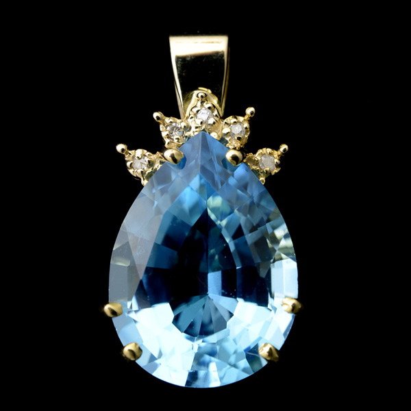 BLUE TOPAZ, DIAMOND, 14K YELLOW GOLD PENDANT.: BLUE TOPAZ, DIAMOND, 14K YELLOW GOLD PENDANT. Featuring one pear-cut blue topaz weighing approximately 9.70 cts., featuring five full-cut diamonds weighing a total of approximately 0.03 ct., set in a