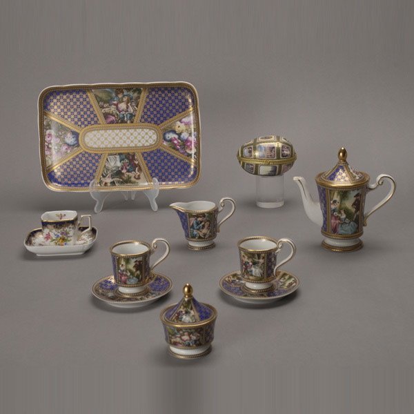 Royal Sevres Porcelain Eight Piece Tea Service, et: Royal Sevres France Floral Decaled Porcelain Eight Piece Tea Service; together with a Limoges porcelain egg; and an associated Royal Severs cup and saucer (11) {Height of teapot 6 3/4 inches; length o