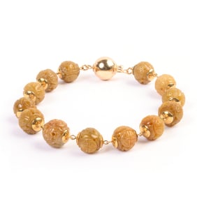 Carved Jade, 14k Yellow Gold Bracelet.