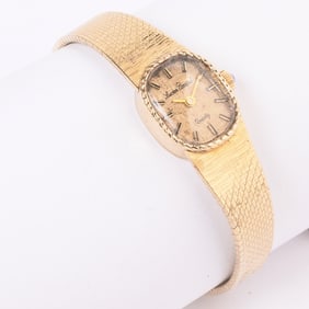 Ladies Lucien Piccard 14k Yellow Gold Wristwatch.