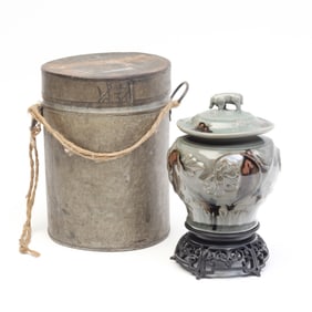 A Chinese Longquan Celedon 'Lotus' Jar and Cover