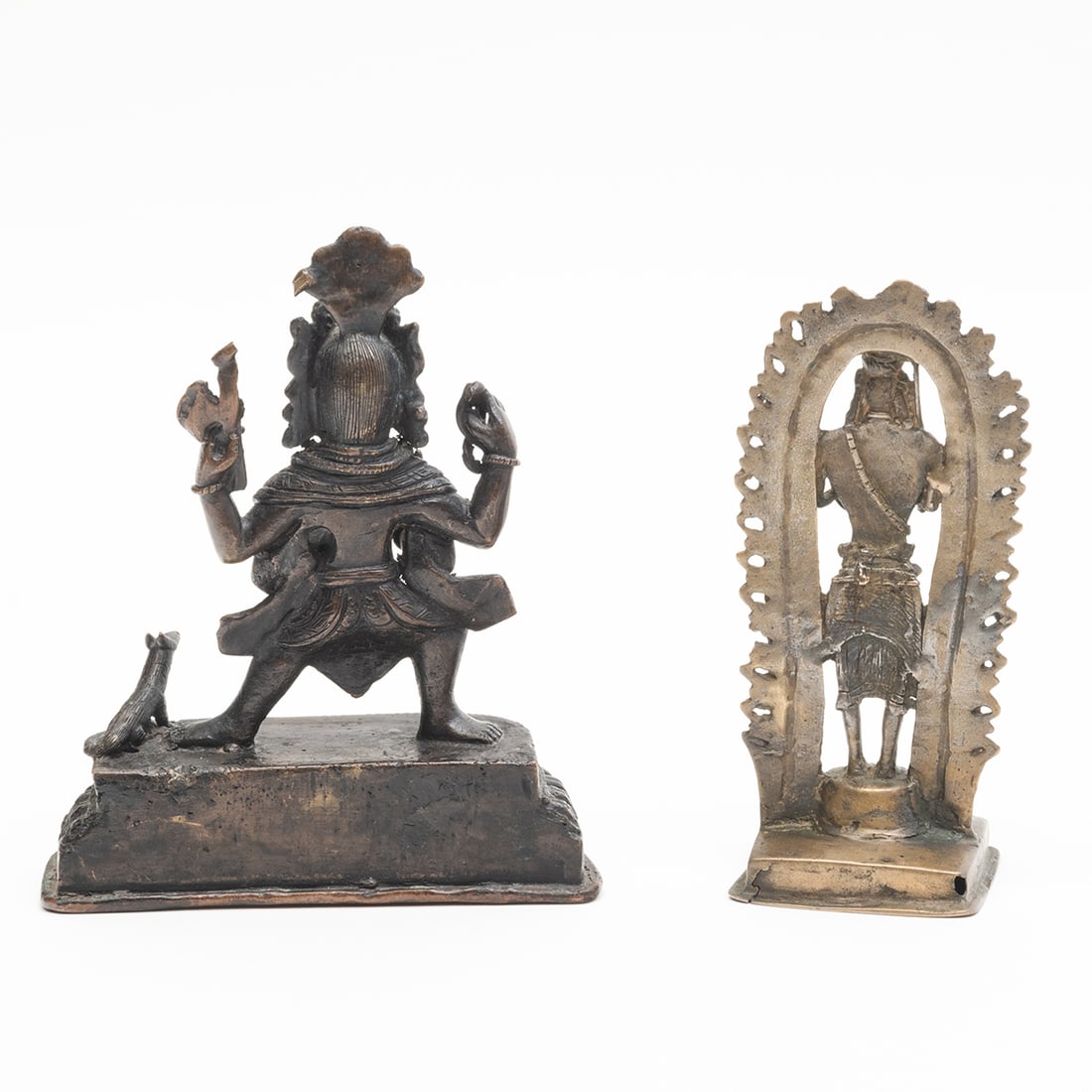 Group of Two Indian Bronze and Metal Figures: Group of Two Indian Bronze and Metal Figures. Including a brass or metal standing figure of Virabhadra, and an Indian bronze and copper Ganesha statue. Circa: late 18th to 19th century. {Tallest: heig