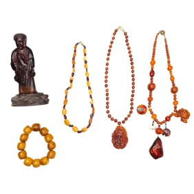 Beaded Necklace, Bracelets, and a Standing Buddha