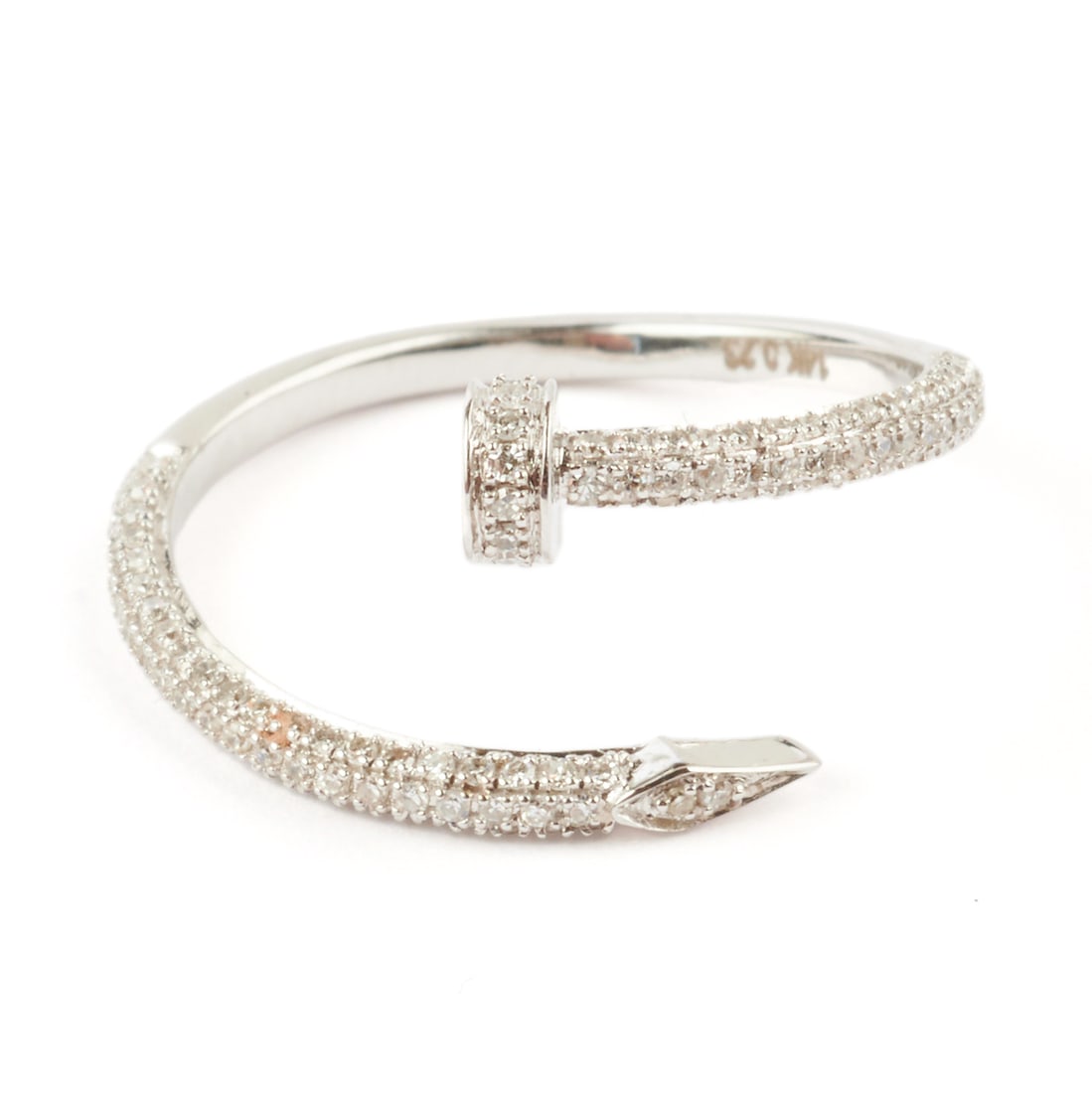 In the Style of Tiffany & Co. Diamond, 14k Gold Ring.: In the Style of Tiffany & Co. "Hardware" Diamond, 14k White Gold Ring. Designed as a bypassing nail, featuring numerous round-cut diamonds weighing a total of approximately 0.23 cttw., set in a 14k wh