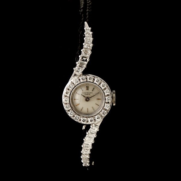 PATEK PHILIPPE DIA., PLATINUM, NYLON WRISTWATCH.: LADIES PATEK PHILIPPE DIAMOND, PLATINUM, NYLON WRISTWATCH. DIAL: Round, silver, applied bar hour markers, baton hands, Patek Philippe Geneve. MOVEMENT: Twenty jewels, adjusted to five positions, heat,