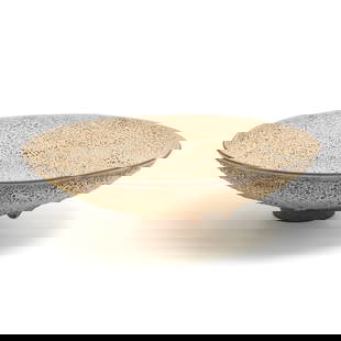 James Lovera Studio Pottery Lava Glaze Bowl: James Lovera Studio Pottery Lava Glaze Bowl. James Lovera (American, California 1920-2015). Shallow round bowl on round foot, cream lava glaze. The underside incised with "lovera 103". {Approximate di