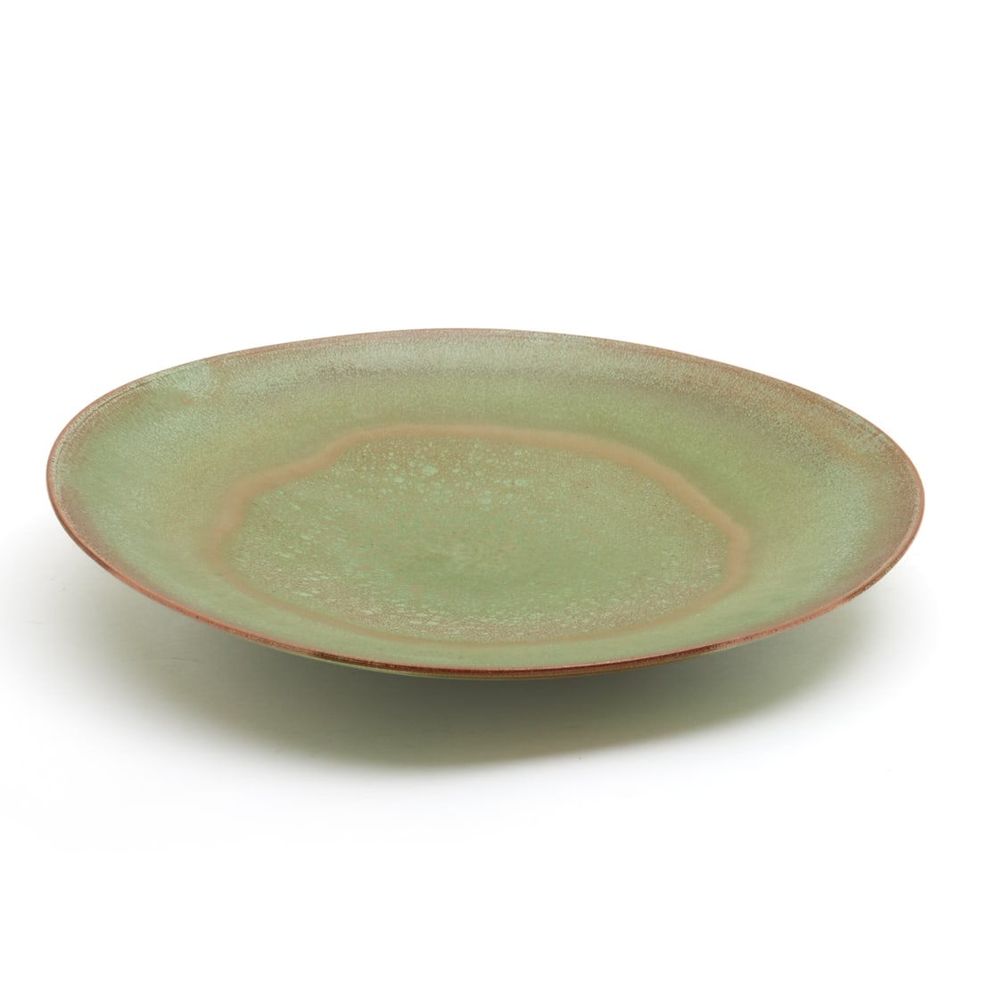 James Lovera Studio Pottery Green Glaze Charger: James Lovera Studio Pottery Green Glaze Charger. James Lovera (American, California 1920-2015). Lime green stoneware charger with ombre glaze to rim, the face with mixed lava glaze, tapering to low fo