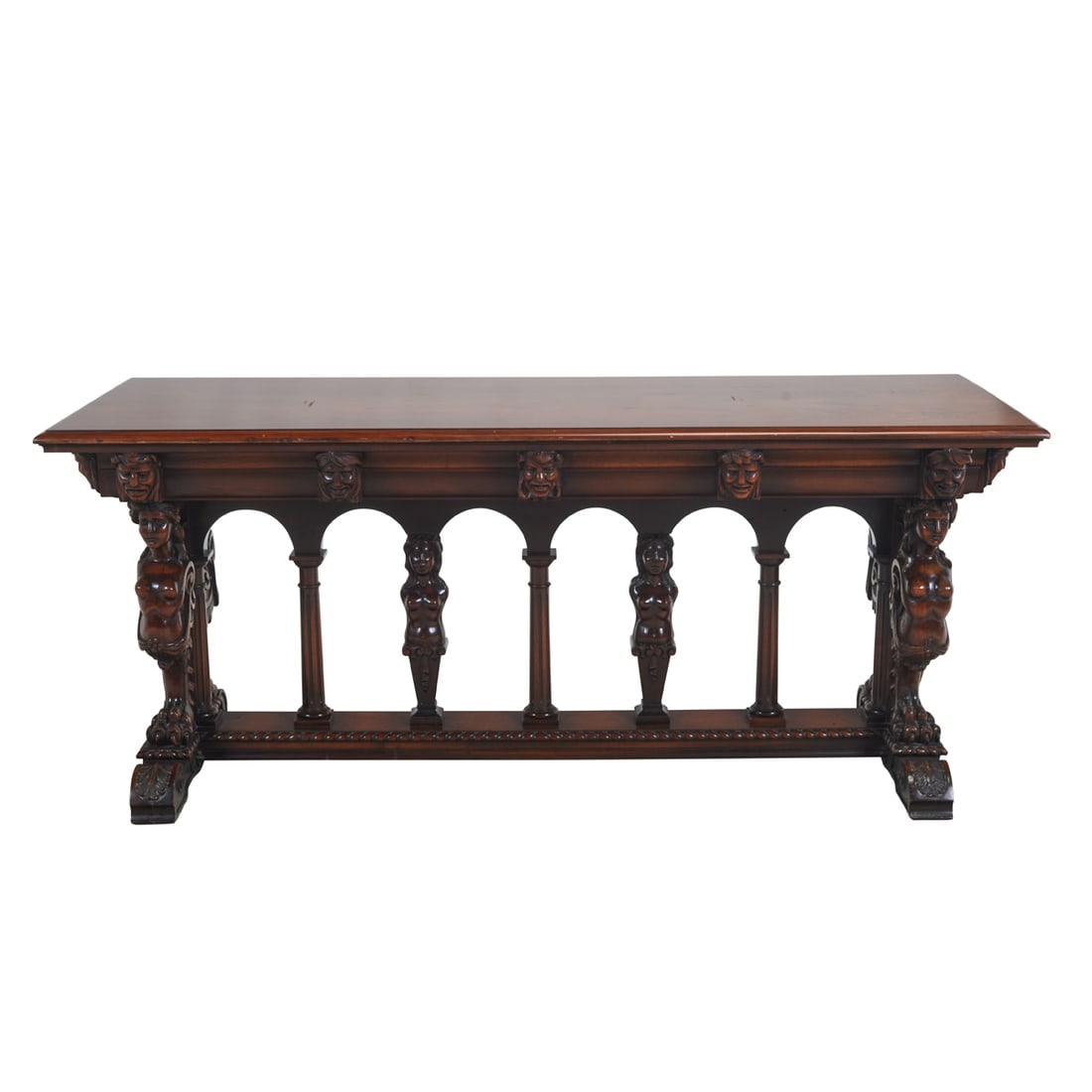 Figural Carved Library Trestle Table: Figural Carved Library Trestle Table. Carved with caryatid supports, masks, scrolled acanthus feet, gadrooned edge to base, and fluted columns. {Approximate dimensions: 30 1/2" high x 72" wide x 28" d
