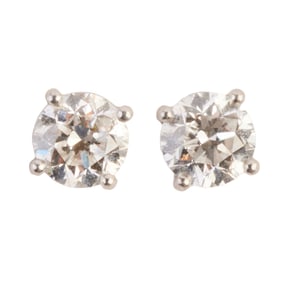 Pair of Diamond, Platinum Stud Earrings.