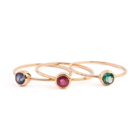 Three Multi-Stone, 14k Yellow Gold Stacking Rings.