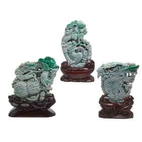 Three Jadeite Carvings on Stands