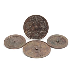 Four Circular Chinese Bronze Mirrors
