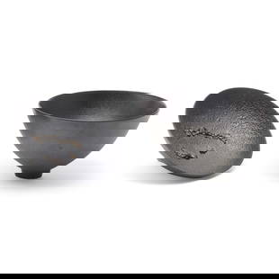 Two James Lovera Studio Pottery Bowls: Two James Lovera Studio Pottery Bowls. James Lovera (American, 1920-2015); comprising black glazed round bowl tapering to narrow round foot, cratered black glazed shallow round bowl with unearthed fos