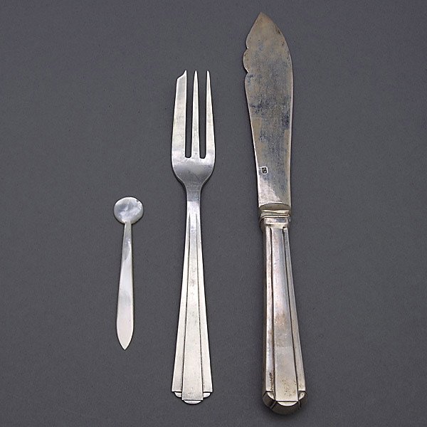 Set of 24 Russian Silver Fish Knives and Forks: Cased Set of Russian 84 Standard Silver Twelve Fish Knives and Twelve Forks, Retailed By Ural Jewelry Store {Total silver weight 36.50 troy oz; length of knives 8 inches; length of forks 6 1/4 inches}