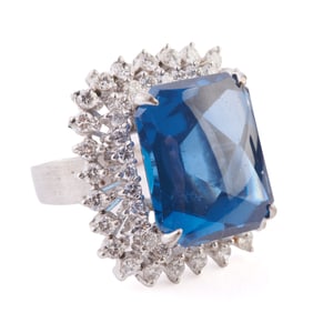 Blue Topaz, Diamond, Rhodium-Plated White Gold Ring.