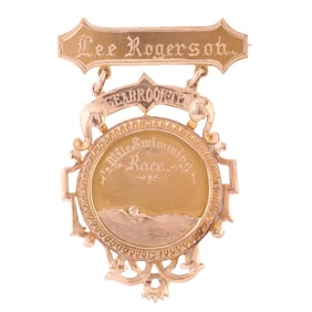 Vintage 14k Yellow Gold Swimming Medal.