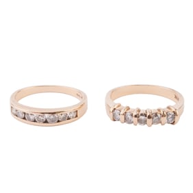 Two Diamond, 14k Yellow Gold Bands.