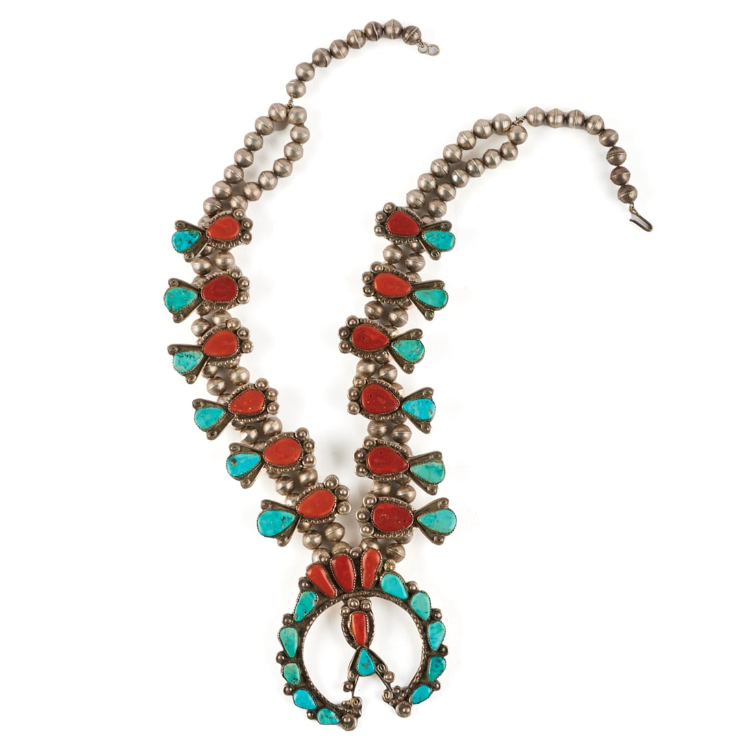 *Native American Squash Blossom Necklace.: *Native American Coral, Turquoise, Silver Squash Blossom Necklace. Featuring one coral and turquoise, silver naja measuring approximately 81 x 79 mm, accented by twelve coral and turquoise, silver squ