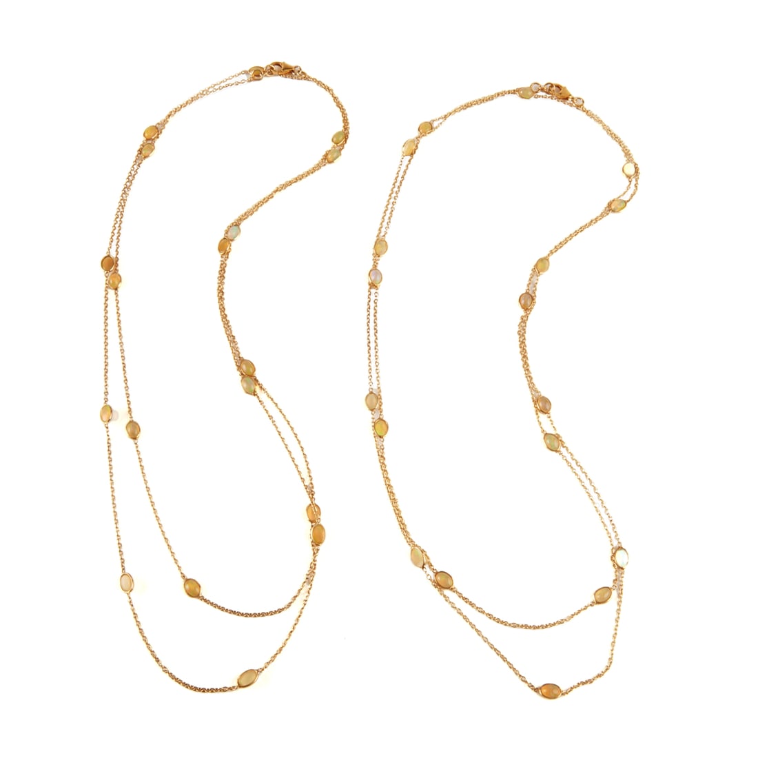 Two Matching Opal, Vermeil Necklaces.: Two Matching Opal, Vermeil Necklaces. Each featuring eighteen oval shaped opal cabochons, bezel set and linked in a vermeil mounting, completed by lobster claw clasps, forming 44 inch necklaces. {Gros