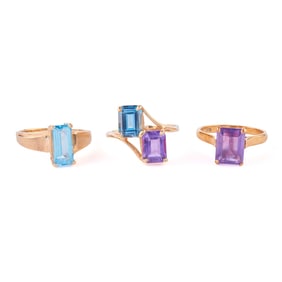 Three Blue Topaz, Amethyst, Yellow Gold Rings.