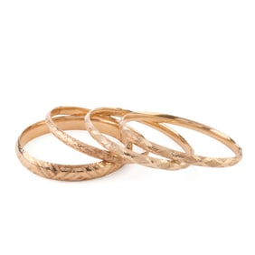 Collection of Four 14k Yellow Gold Bracelets.
