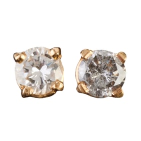 Pair of Unmatched Diamond Stud Earrings.