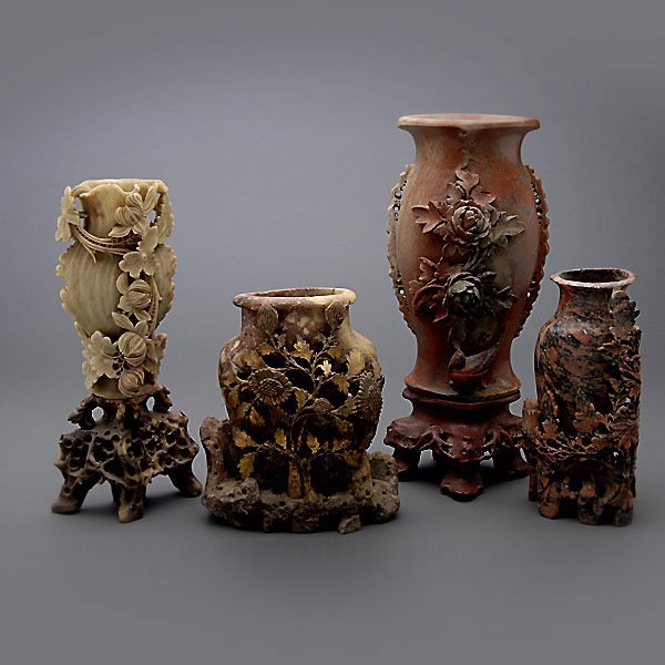 Four Carved Soapstone Vases: Four Carved Soapstone Vases, each decorated with various leafy flowers {Tallest: 11 3/4 inches (30 cm)} [Chips, nicks]