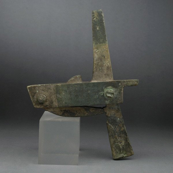 A Bronze Crossbow, Wei Kingdom, 3 Kingdoms Period: A Bronze Crossbow, Wei Kingdom, Three Kingdoms Period, with four working parts, including the frame, hook, trigger and trigger rest, and two passive axles, supported within a bronze casing sunk comple