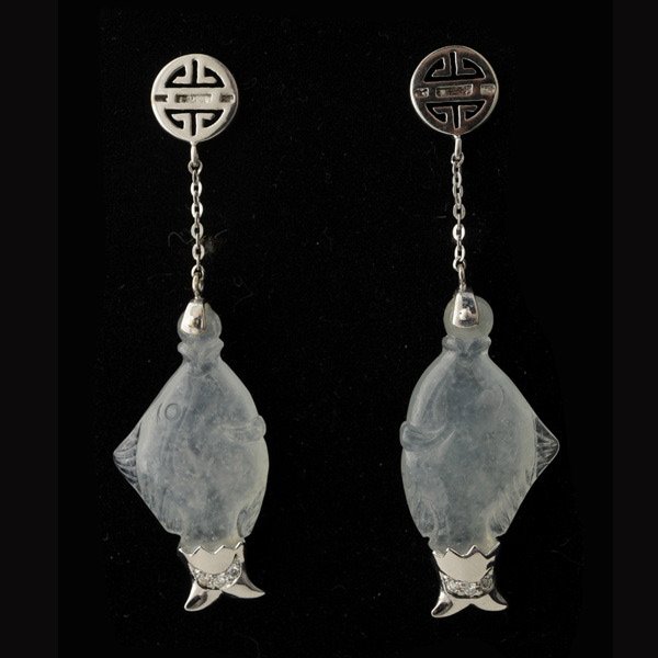 PAIR OF JADE, 18K WHITE GOLD FISH EARRINGS.: PAIR OF JADE, 18K WHITE GOLD FISH EARRINGS. Each features one carved jadeite fish measuring approximately 24 x 15 mm, set in an 18k white gold drop style mounting. Accompanied by a Mason Kay Report #2