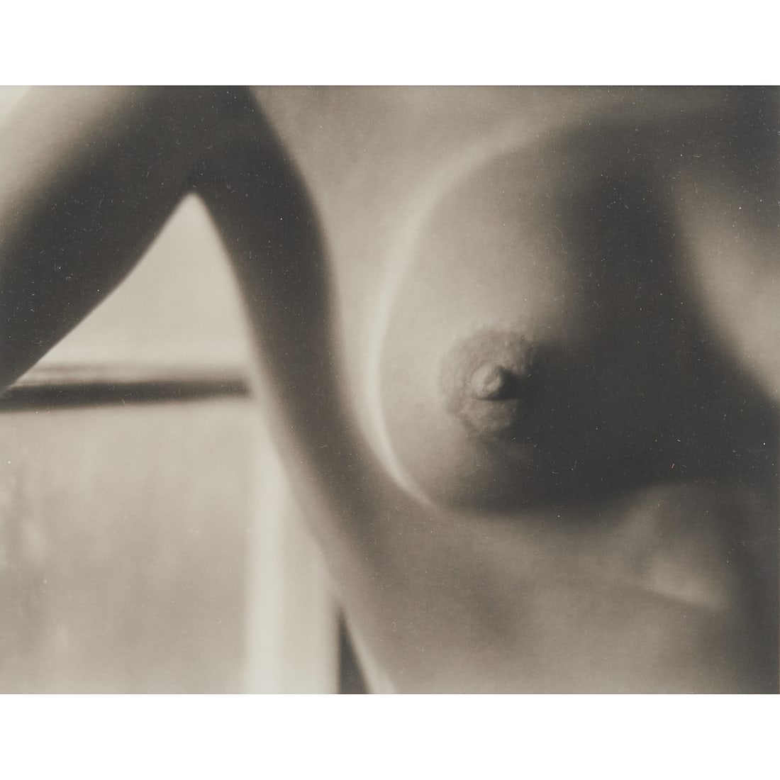 Edward Weston, Breast, a later print: EDWARD WESTON (American, 1886-1958), Breast, (Nude), 1920-1922, platinum print, printed later, sight: 6-7/8 x 9 inches, with stamps "Negative by Edward Weston" and "Printed Under The Supervision," sig