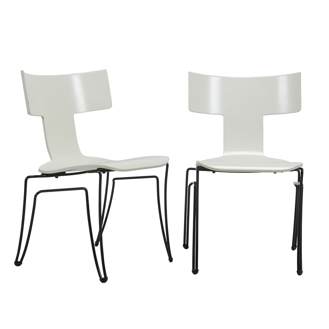 Set of Eight John Hutton for Donghia Anziano Chairs: Set of Eight John Hutton for Donghia Anziano Chairs. White bodies on black metal stackable bases. Donghia labels to the undersides. {Approximate dimensions: 31 1/2" high x 20 5/8" wide x 21 1/2" deep.