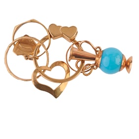 Collection of Yellow Gold Charms on Key Chain.