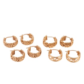 Four Pairs of 14k Yellow Gold Hoop Earrings.