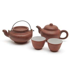 Four Chinese Yixing Teapots and Teacups