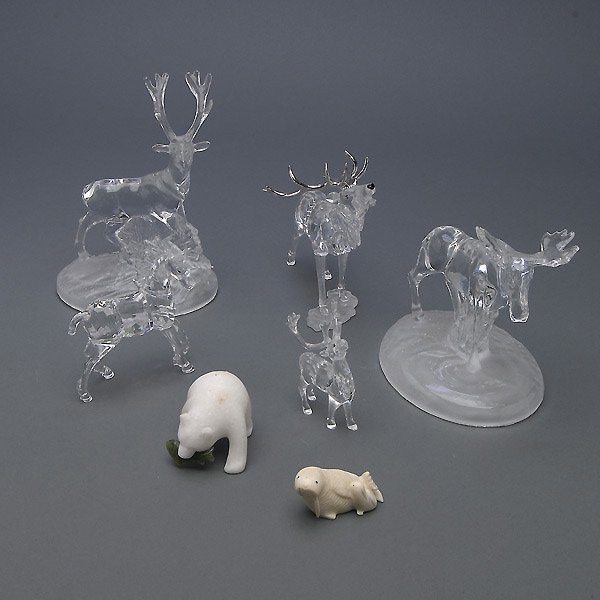 Six Swarovski Style Figures and Two Inuit Carvings: Five Swarovski Style Crystal Figures, a Glass Lithophane, and Two Inuit Carvings {Height of tallest 7 1/4 inches} [Lithophane not pictured]