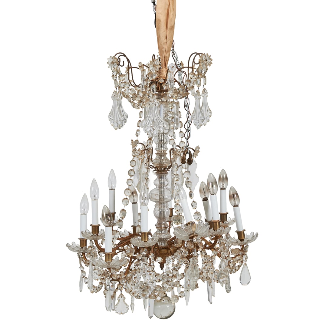 Pair of Louis XVI Style Twelve Light Chandeliers: Pair of Louis XVI Style Twelve Light Chandeliers. Gilt metal frames with glass lusters and mounts. {Approximate dimensions: 36" high x 26" diameter.}.
