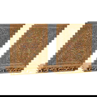 Pair of Tiffany Studios Enameled Gilt Bronze Venetian Bookends: Pair of Tiffany Studios Enameled Gilt Bronze Venetian Bookends. Gilt bronze pair with relief decoration; enamel in red, green, and blue to sunken areas; felt to undersides. Both with "TIFFANY STUDIOS