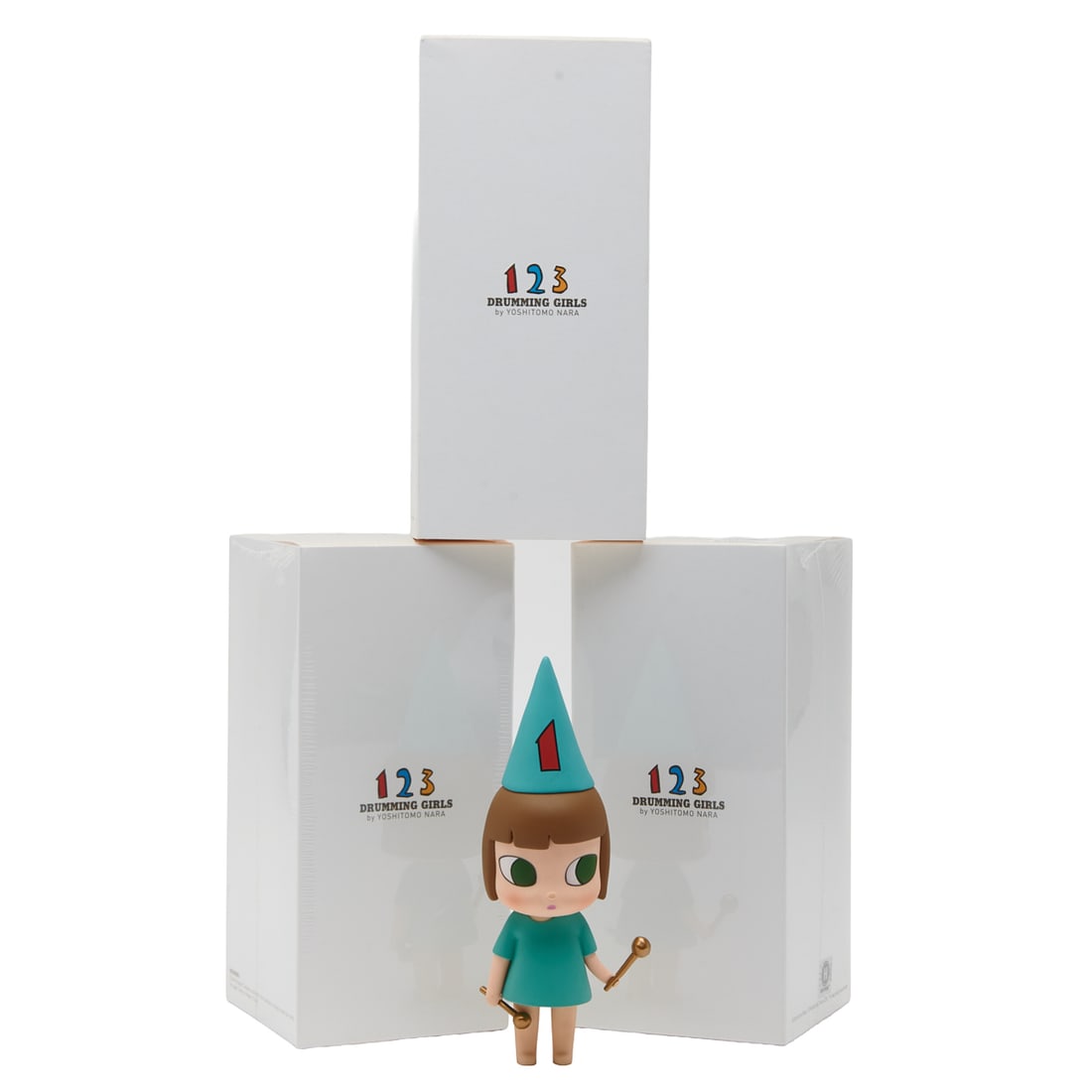 Set of Three Yoshitomo Nara "Drumming Girl" Figures: Set of Three Yoshitomo Nara "Drumming Girl" Figures. Yoshitomo Nara (Japanese, b. 1959); comprising #1, 2, and 3; all with original boxes, two still sealed in plastic wrap. {Approximate dimensions: Fi